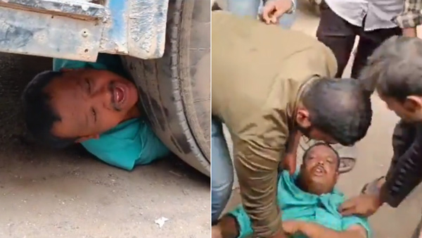 man attempts suicide under bus tyre