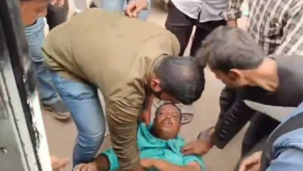 man attempts suicide under bus tyre