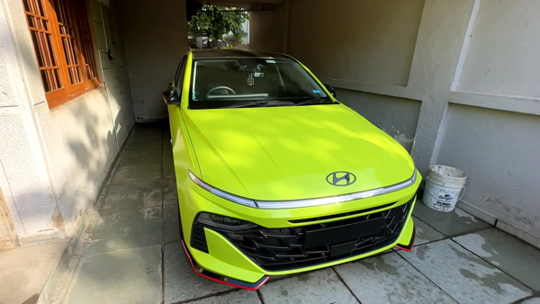 hyundai verna in neon green colour wrap