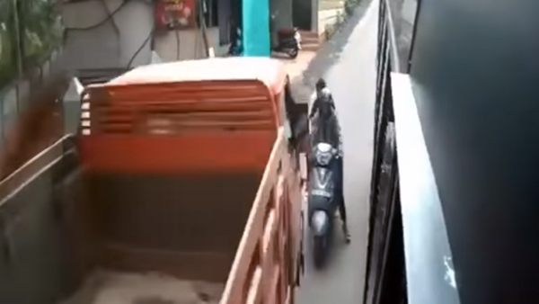 Scooter Riders Miraculously Escaped From Road Accident