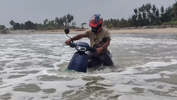 Ola escooter rides into sea Ola escooter rides into sea