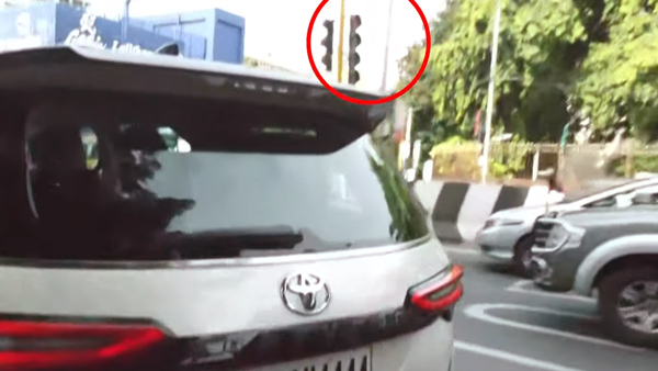 minister ponmudi car traffic violation