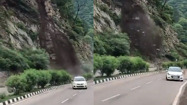 tourists car escaped from land slide