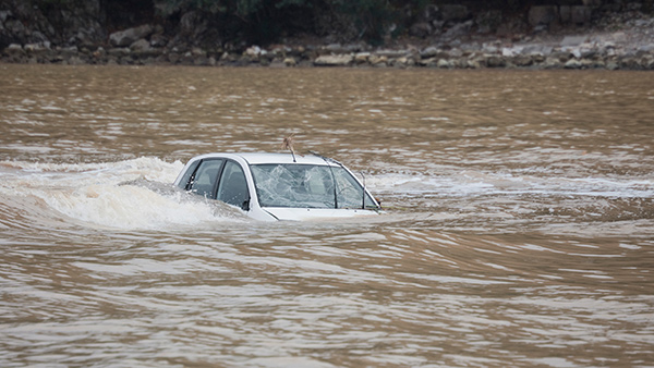 Car sinking in river