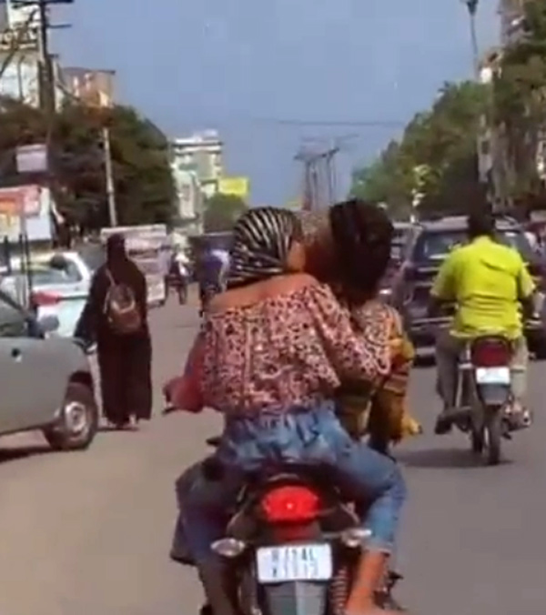 Couple romance moving bike
