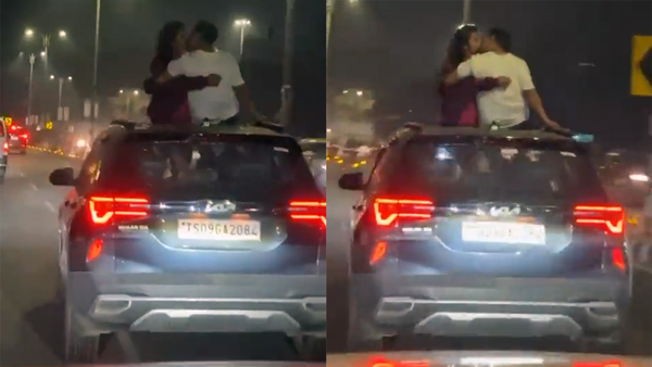 Couple Romancing On Kia Seltos Sunroof