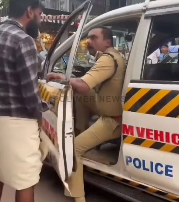man stopped police officer vehicle