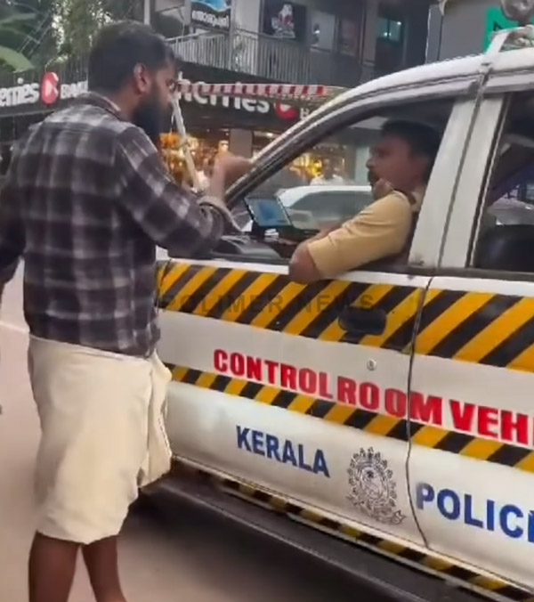 man stopped police officer vehicle