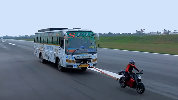 bus pulled by ultraviolette f77