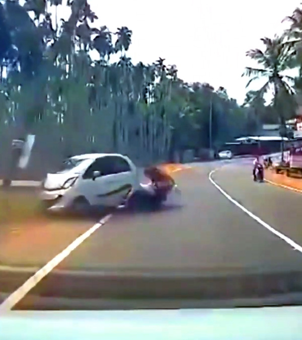 tata nano crashes while overtaking