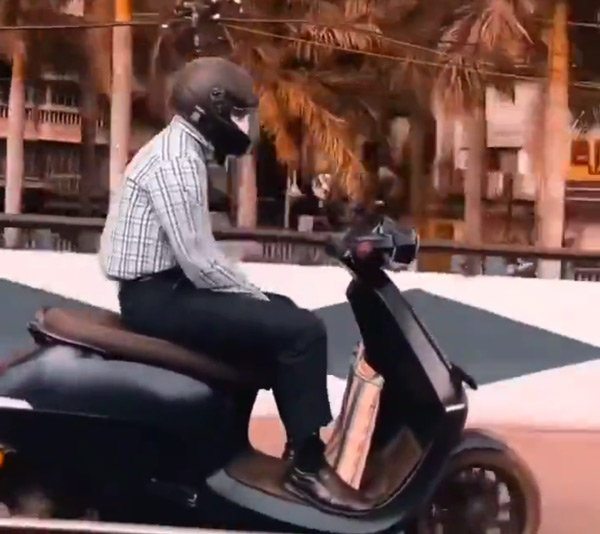 man rides scooter without control