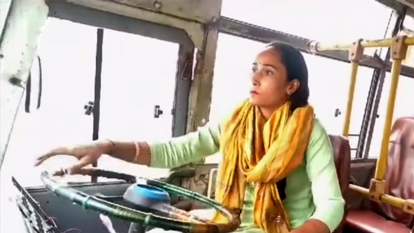 postgraduate woman becomes bus driver