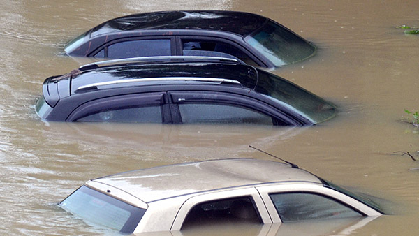 vehicle flooded in the rain tips