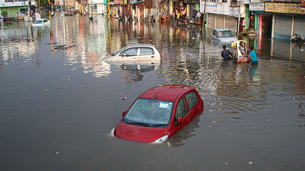 vehicle flooded in the rain tips