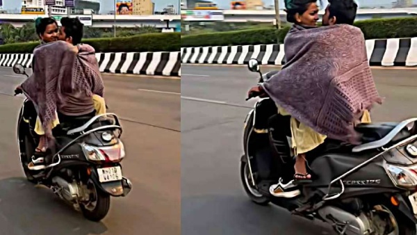 Couple Seen Romancing On Moving Suzuki Access