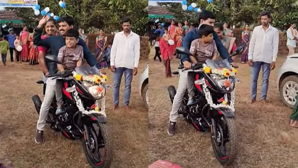 Villagers gift bike to teacher Villagers gift bike to teacher