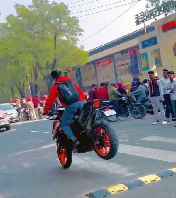 young man stunts on road young man stunts on road