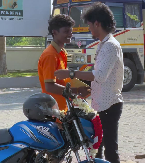 Bala gifted tvs bike petrol bunk employee