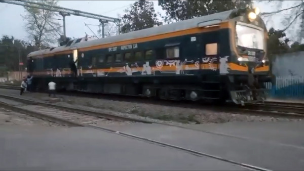 railway men push train coach railway men push train coach