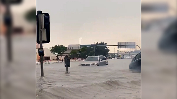 dubai floods airport malls waterlogged