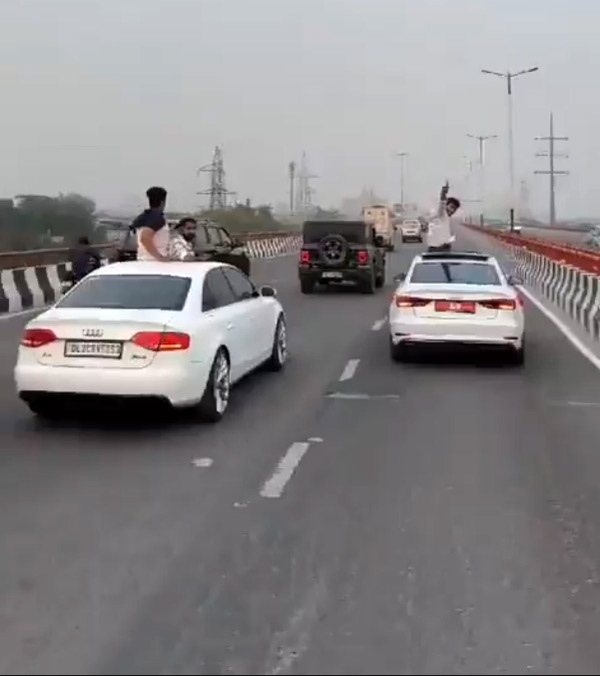 youths traveled on car sunroof