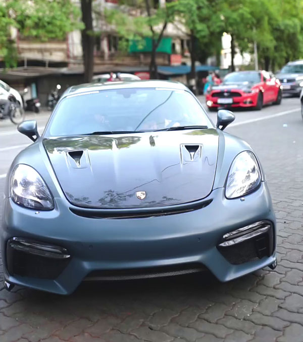 dolly chaiwala with porsche cayman