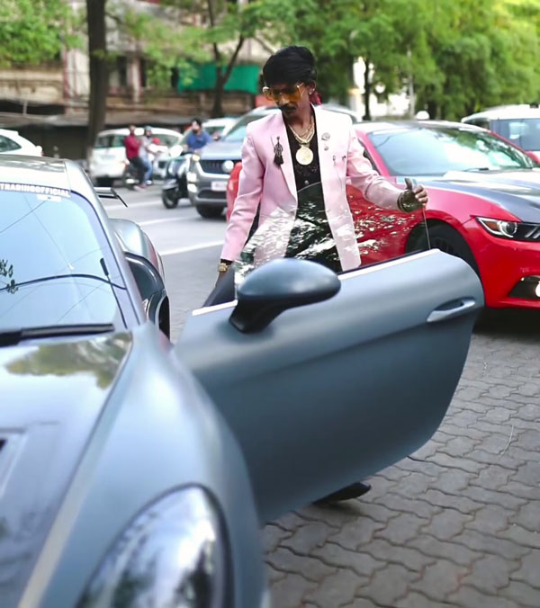 dolly chaiwala with porsche cayman