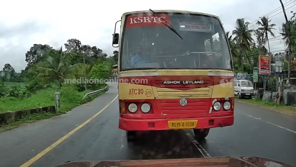 Car Driver Blocks Government Bus