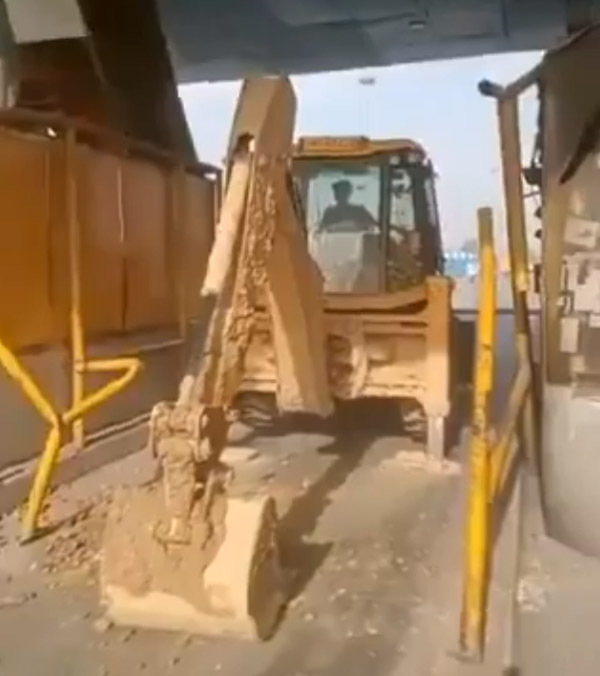 jcb driver smashed toll booths
