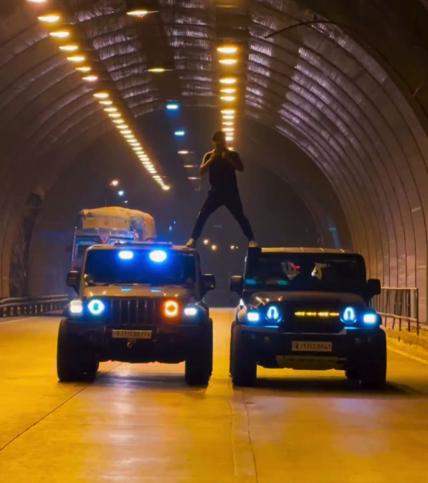 man stunts on mahindra thar