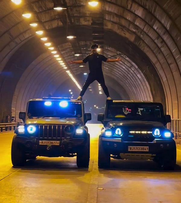 man stunts on mahindra thar