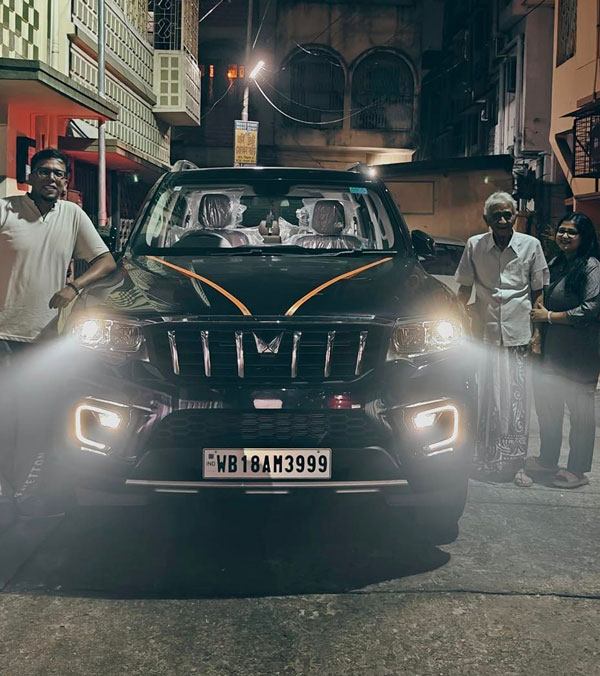 grandfather look at grandson s mahindra