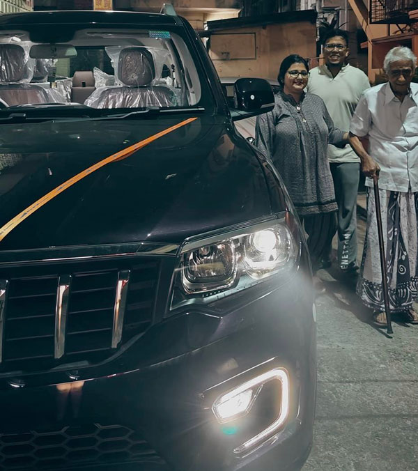 grandfather look at grandson s mahindra