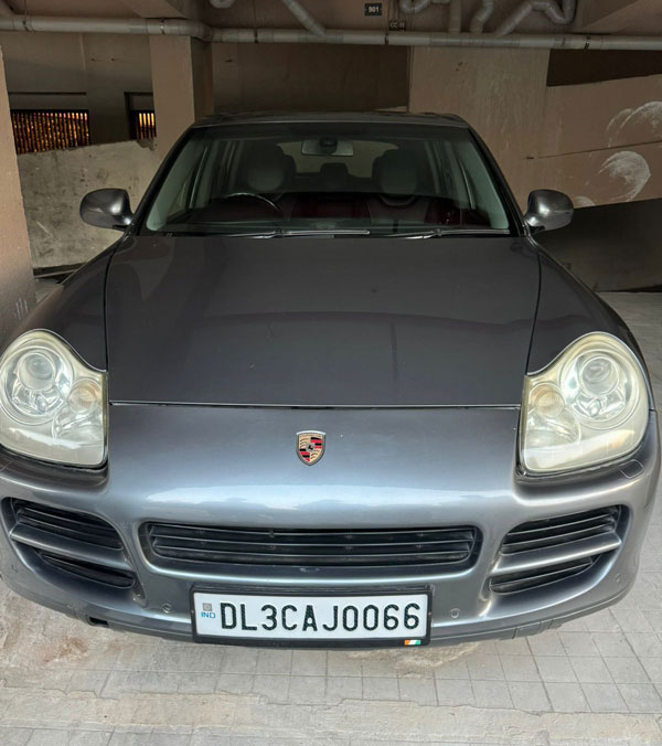 Government employee owning porsche car