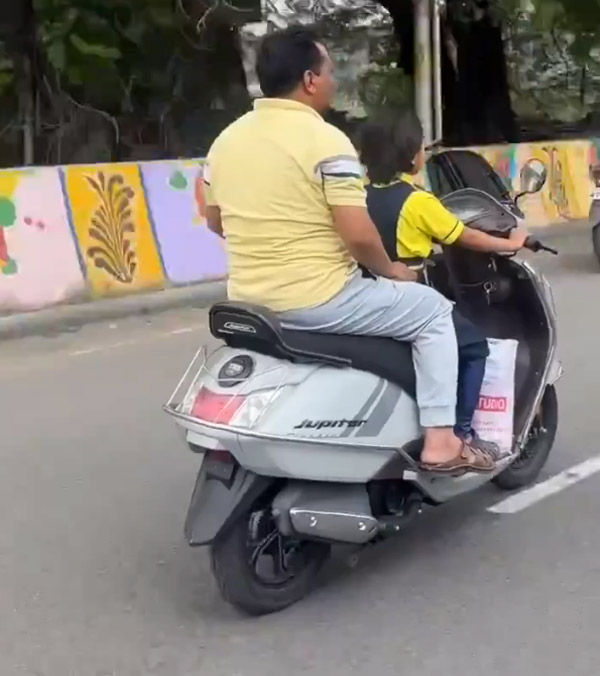 schoolgirl rides scooter on road schoolgirl rides scooter on road