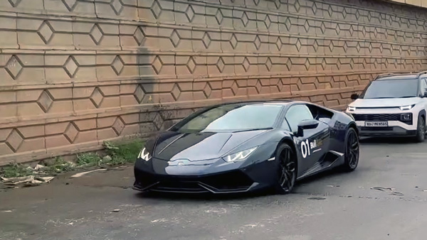 lamborghini huracan jumps into pothole