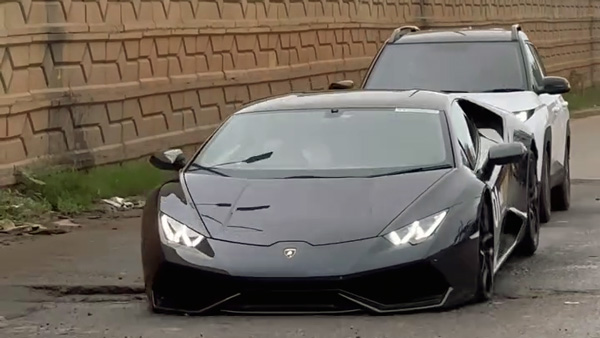 lamborghini huracan jumps into pothole