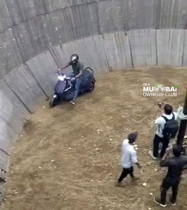 ola electric scooter rider performs