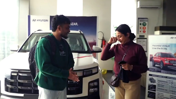 son gifts car to parents