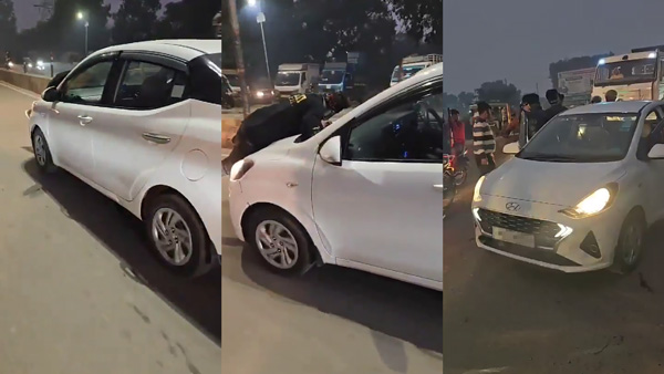 Man Hanging On Hyundai Aura Bonnet