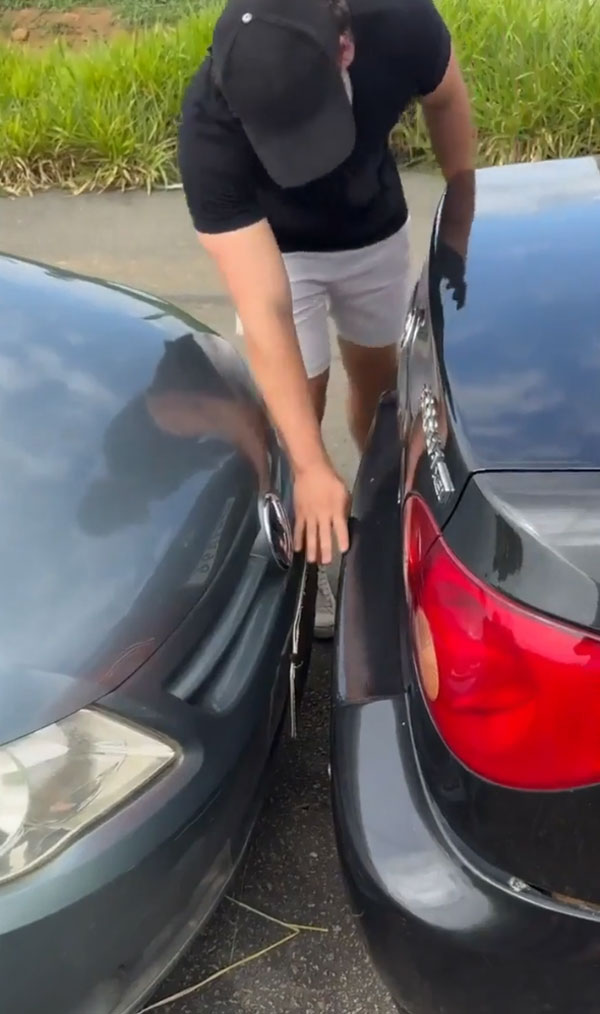 driver taking car out parking