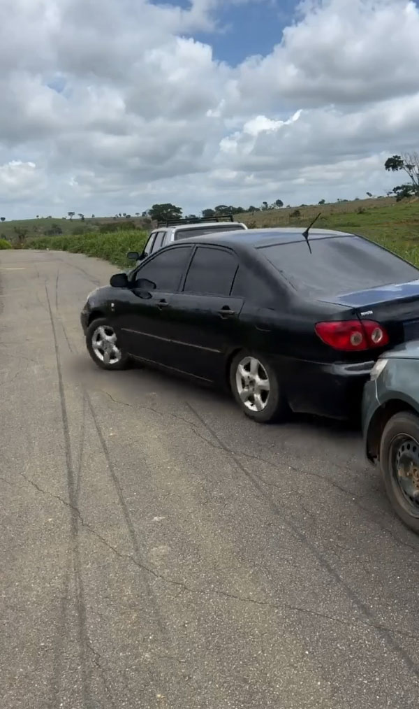 driver taking car out parking