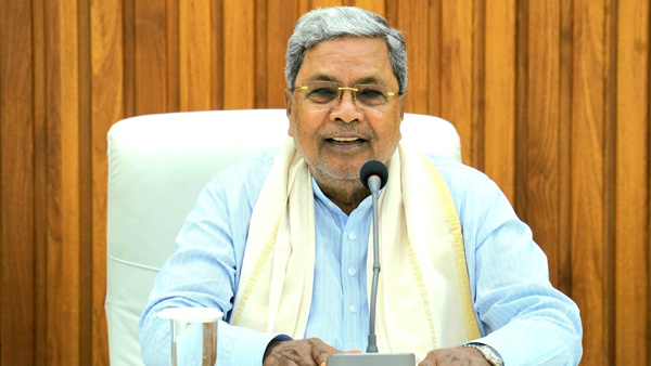 cm siddaramaiah rides toyota vellfire