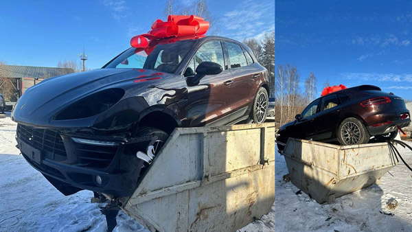 Porsche macan car dumped in garbage container