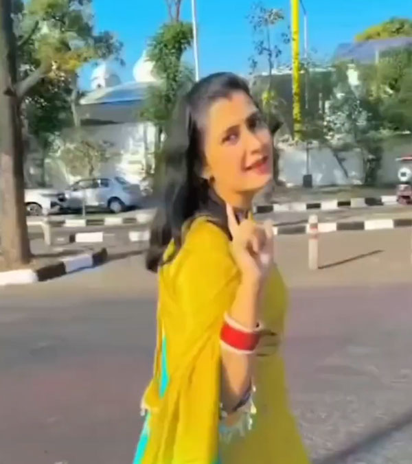 woman dances middle of road woman dances middle of road