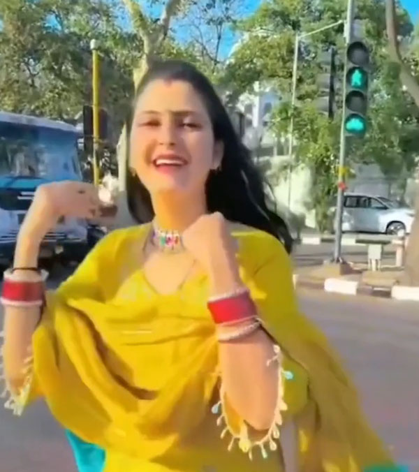 woman dances middle of road woman dances middle of road