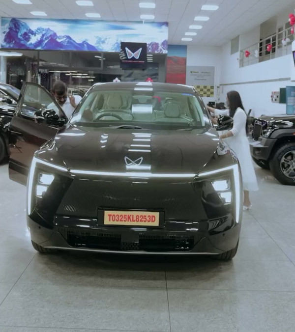 nikhil-lena couple buys mahindra car