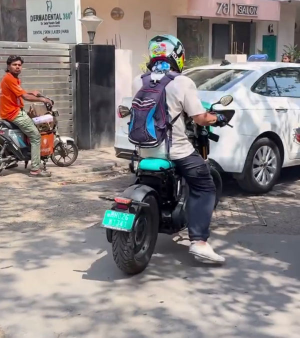 actor with bmw ce 02