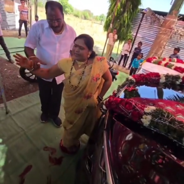 indian husband lifts wife