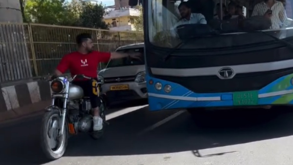 man performed stunts in road